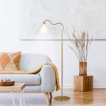 Majestic Brass Ring Base Curved Floor Lamp with Triangle White Drum Shade - Image 2